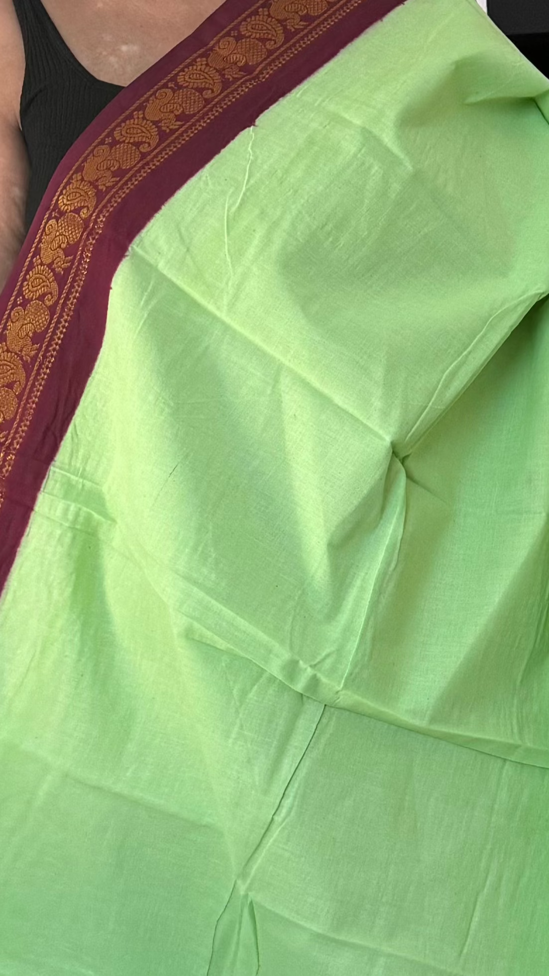 Pastel green and brown sungudi cotton small border saree