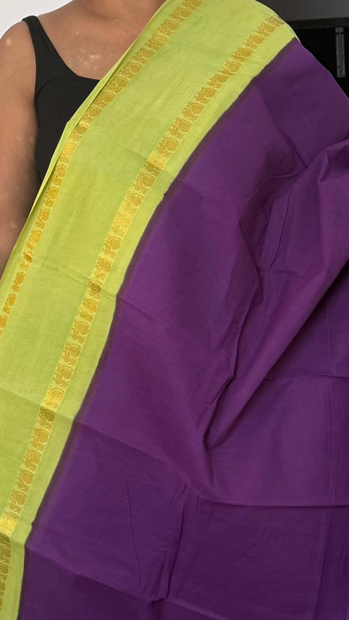 Violet and flourescent green sungudi cotton saree with retta pettu border